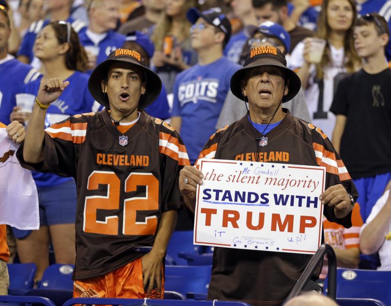 Cleveland Browns fans hold a sign following the national anthem before an NFL football game between the Indianapolis Colts and the Cleveland Browns in Indianapolis. (AP Photo/Michael Conroy, File)