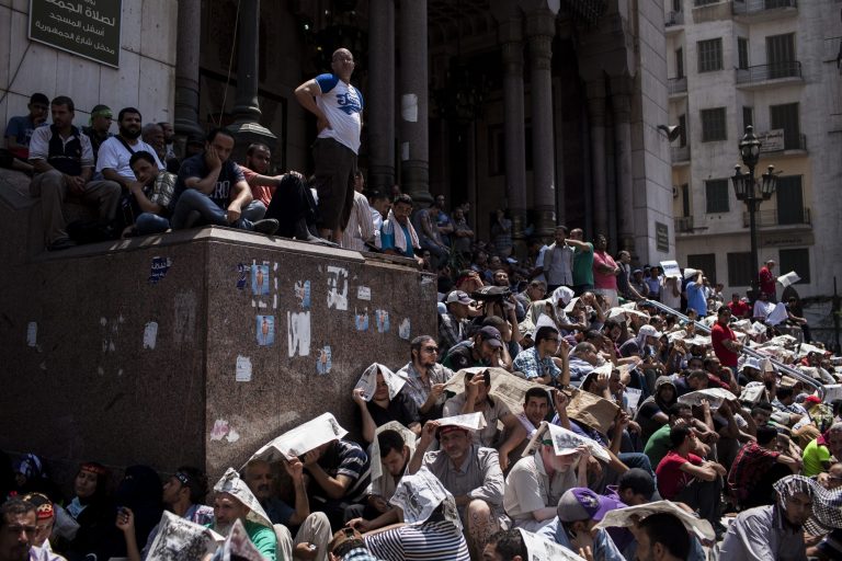 Supporters of deposed Egyptian President Mohammed Morsi gather at the Fateh Mosque in Ramses Square for midday prayer in Cairo, Egypt. (Ed Giles/Getty Images)