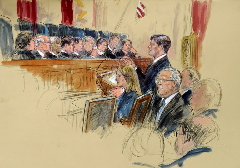 This artist rendering shows Senate Minority Leader Mitch McConnell of Ky., seated, center, listening as attorney Bobby Burchfield,standing, right, argues for McConnell during the Supreme Court's hearing on campaign finance, Tuesday, Oct. 8, 2013, at the Supreme Court in Washington. Justices, from left are, Sonia Sotomayor, Stephen Breyer, Clarence Thomas, Antonin Scalia, Chief Justice John Roberts, Anthony Kennedy, Ruth Bader Ginsburg, Samuel Alito and Elena Kagan.  (AP Photo/Dana Verkouteren)