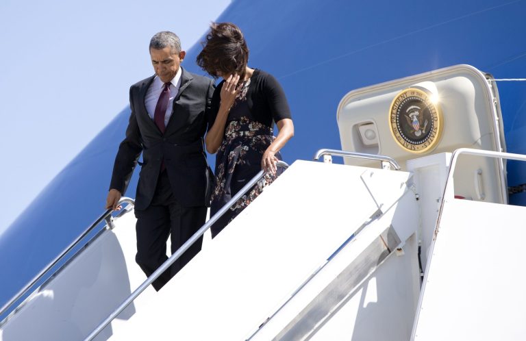 President Obama and first lady Michelle Obama disembark Air Force One upon their arrival at Robert Gray Army Air Field in Killeen, Texas, on Wednesday. (AP Photo/Carolyn Kaster)