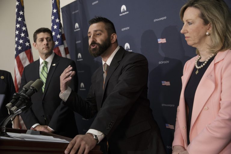 Nick Yacoub of Langley, Va., center, joined by House Speaker Paul Ryan of Wis., left, and Rep. Barbara Comstock R-Va., talks about his recovery from addiction to opioid painkillers during a news conference on Capitol Hill on April 13. (AP Photo/J. Scott Applewhite)