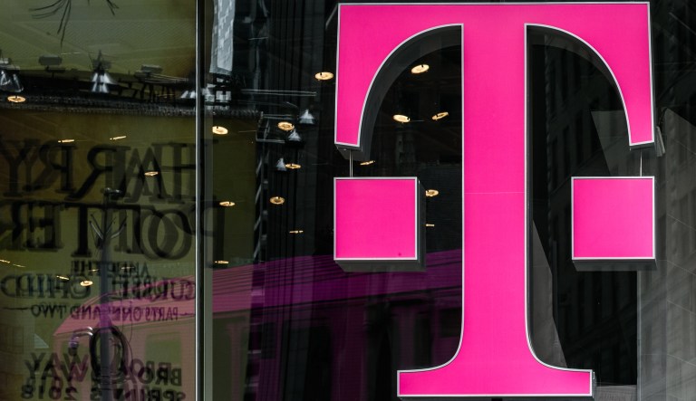 A T-Mobile logo is displayed on a store location in New York on April 30, 2018.