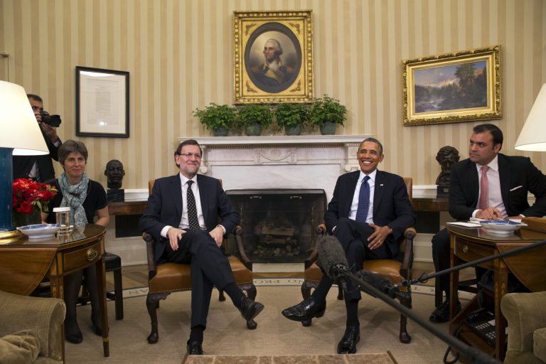 Spanish Prime Minister Mariano Rajoy, left, and President Barack Obama, smile at the end of their meeting in the Oval Office of the White House in Washington, Monday, Jan. 13, 2014. (AP Photo/Jacquelyn Martin)