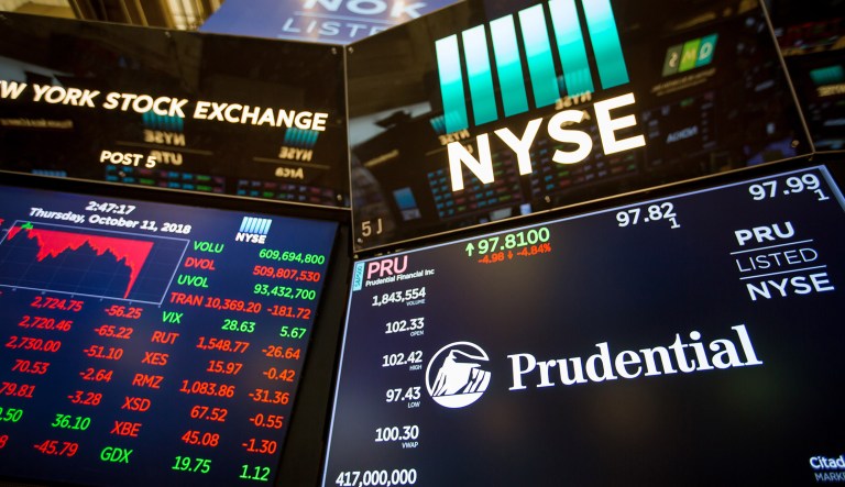 A monitor displays Prudential Financial Inc. signage on the floor of the New York Stock Exchange (NYSE) in New York, U.S.