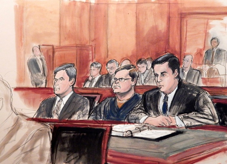 Buryakov (center) pleaded guilty in March of last year to conspiring to work as an agent for Russian intelligence. (AP Photo/Elizabeth Williams)