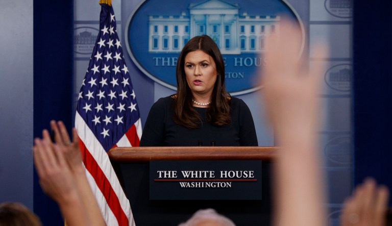 Sanders indicated later she was not suggesting that people protest police. (AP Photo/Evan Vucci)