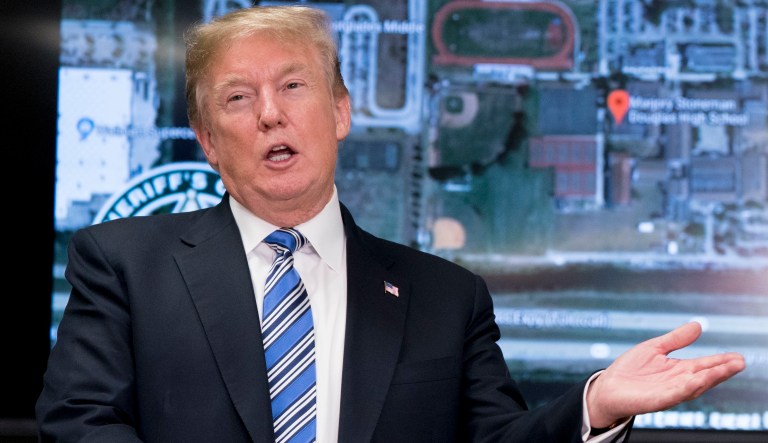 President Trump has come under fire for linking Wednesday's shooting at Marjory Stoneman Douglas High School, in Parkland, Fla., to the ongoing federal investigation into Russian meddling in the 2016 election. (AP Photo/Andrew Harnik)