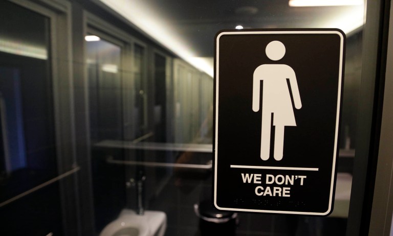 A sign outside a restroom at 21c Museum Hotel in Durham, N.C. (AP Photo/Gerry Broome, File)