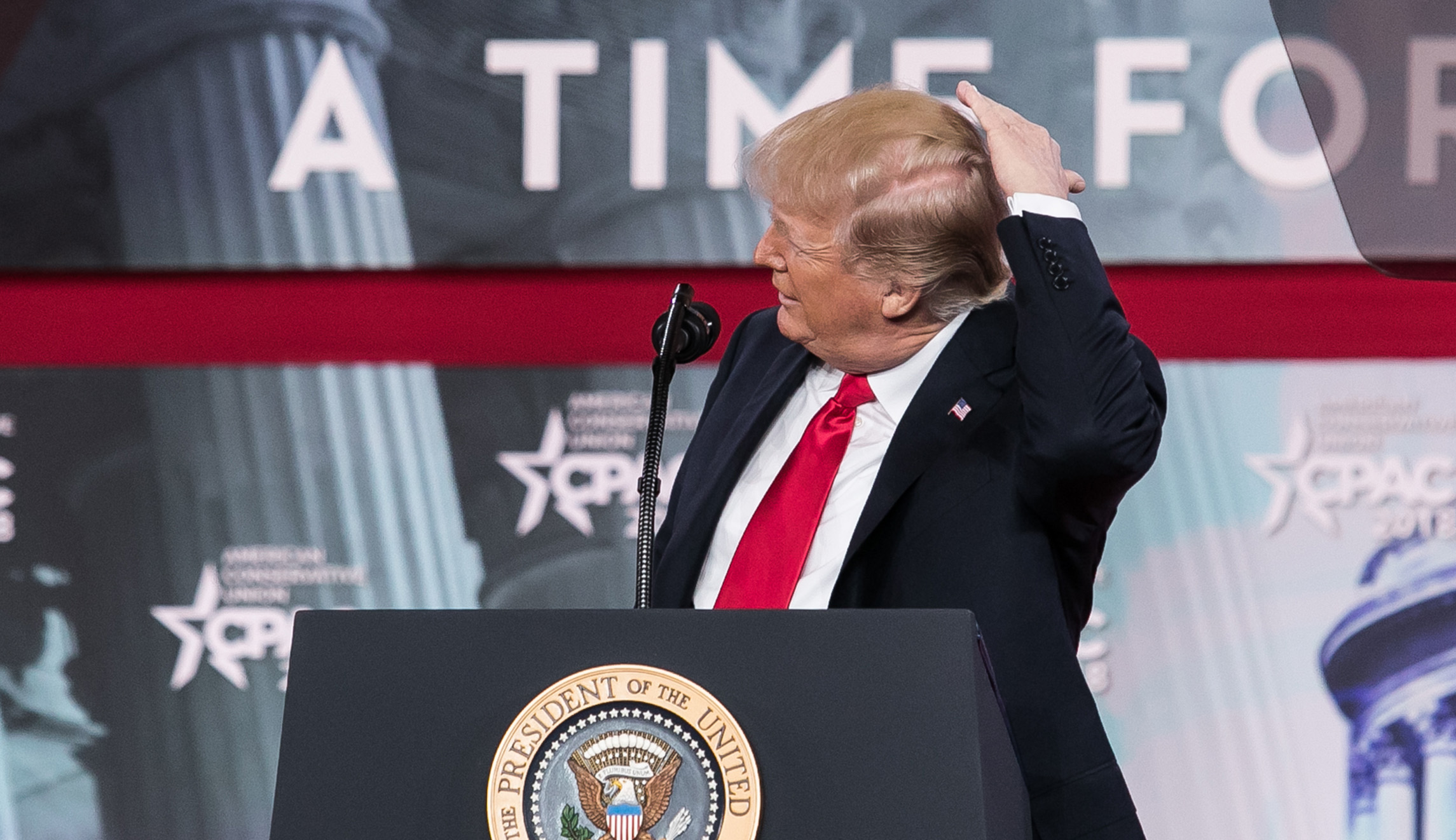 Trump lets his hair down at CPAC: ‘I try like hell to hide that bald spot, folks’