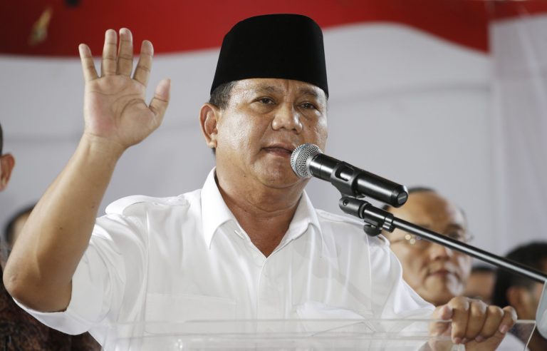 Indonesian presidential candidate Prabowo Subianto gestures during a press conference in Jakarta, Indonesia, Tuesday,  July 22, 2014. Nearly complete results in Indonesia's presidential elections showed Jakarta governor Joko Widodo leading with 52 percent of the vote. (AP Photo/Achmad Ibrahim)