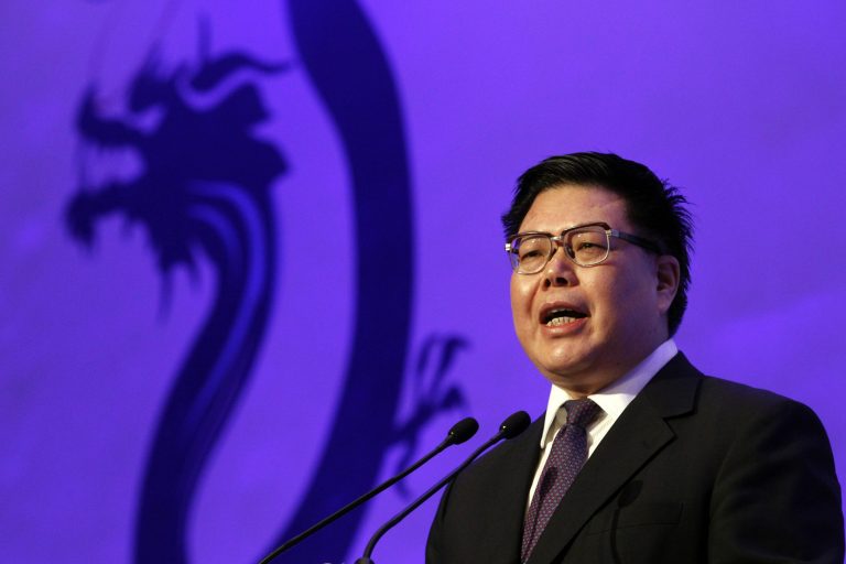   Wang Changshun, the chairman of Air China speaks at the International Air Transport Association's annual general meeting held in Beijing, China, Monday, June 11, 2012. The IATA announced that Wang has been elected President of the associationâs 68th Annual General Meeting and World Air Transport Summit, which opened Monday in Beijing, China. (AP Photo/Ng Han Guan)  