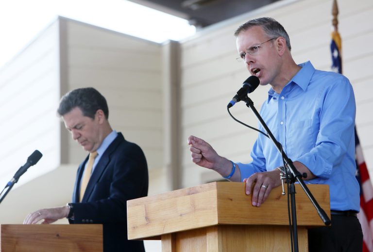 Rep. Paul Davis, a Democrat, takes a turn during his gubernatorial Debate against Gov. Sam Brownback, a Republican, at the Kansas State Fair Sept. 6 Hutchinson, Kan. (AP Photo/The Hutchinson News, Lindsey Bauman)