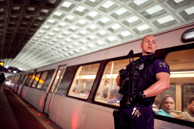 Metro Transit Police officers patrol at the Chinatown Metro Station in Washington, D.C., on Monday May 2, 2011.