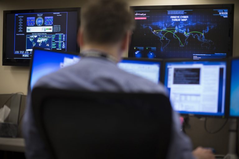 The two agreed on key principles prohibiting state-backed cyberattacks against other countries. (AP Photo/John Minchillo)