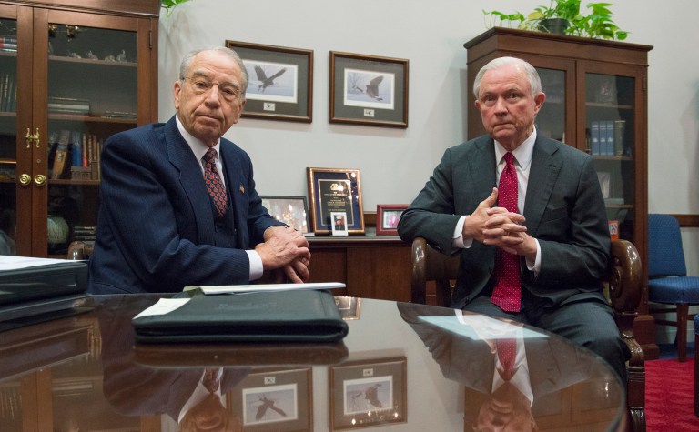 Sen. Jeff Sessions, right, President-elect Donald Trump's nominee for attorney general, will get a two-day confirmation hearing the second week in January, Senate Judiciary Committee Chairman Charles Grassley announced late Friday. (AP Photo/Molly Riley)