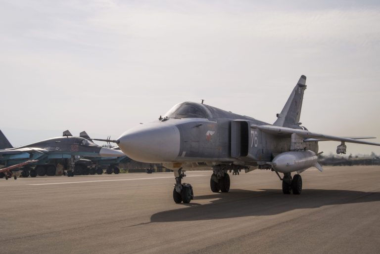 A pair of Syrian planes, identified by the Pentagon as Russian-made Su-24s, bombed a location where Kurdish fighters were in operation with the American advisers. (AP Photo)