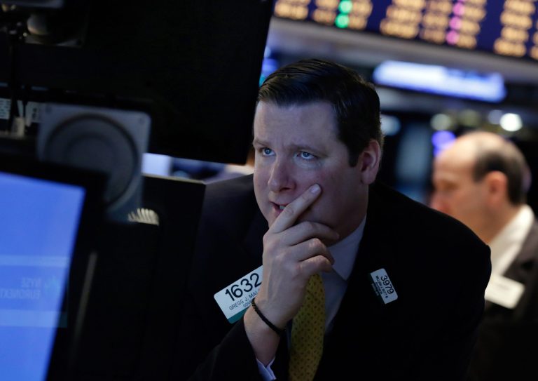 FILE - In this Monday, March 3, 2014, file photo, specialist Gregg Maloney works on the floor of the New York Stock Exchange. Shares rose ahead of a monthly policy meeting of the European Central Bank on Thursday March 6, 2014 as easing tensions in the Ukraine kept markets stable after their recent bout of volatility.  (AP Photo/Richard Drew, File)
