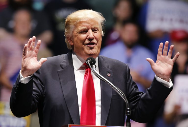 Romney said on CNN on Friday that Trump's presidency could legitimize racism, bigotry and misogyny. (AP Photo/Steve Helber)