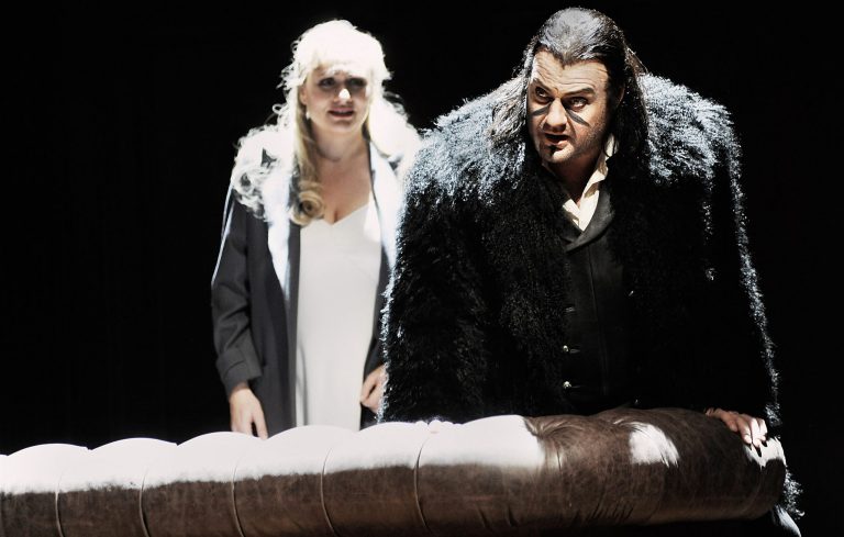   In this undated photo provided by the Opernhaus Zurich Bryn Terfel in the role of the Hollaender (Dutchman), right, and Anja Kampe as Senta, left, perform on stage during a dress rehearsal for Richard Wagner's opera 