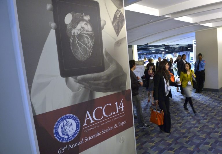 People attend the American College of Cardiology's conference in Washington, Saturday, March 29, 2014. A new class of experimental medicines can dramatically lower cholesterol, raising hopes of a fresh option for people who can't tolerate or don't get enough help from Lipitor and other statin drugs that have been used for this for decades. The first large studies of these drugs were presented Saturday at an American College of Cardiology conference in Washington, and more will follow on Sunday.  (AP Photo/Susan Walsh)