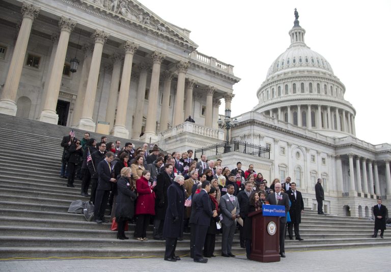 Actress America Ferrera, surrounded by House Democrats and immigration leaders, speaks on the steps of the Capitol on Wednesday during a new conference. (AP/Carolyn Kaster)