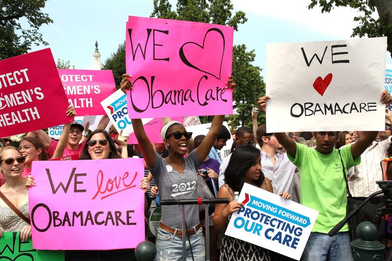 WASHINGTON, DC - JUNE 28: Obamacare supporters react to the  U.S. Supreme Court decision to uphold President Obama's health care law, on June 28, 2012 in Washington, DC. Today the high court upheld the whole healthcare law of the Obama Administration.  (Photo by Mark Wilson/Getty Images)