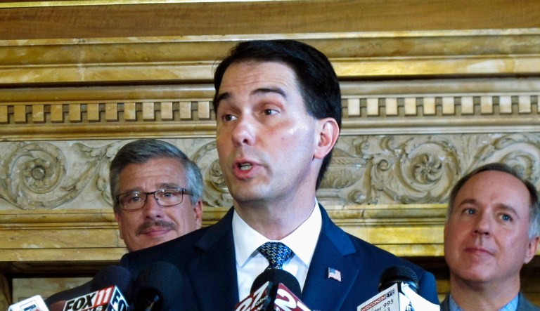 Republican Gov. Scott Walker applauded the ruling and defended the purpose of the law. (AP Photo/Scott Bauer, File)