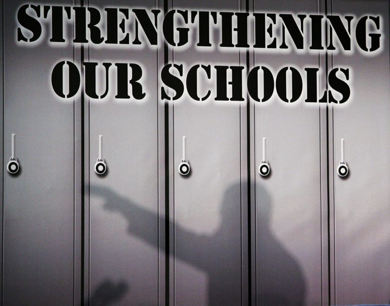 In this Feb. 12, 2015 photo, Yamarko Brown, age 12, works on math problems as part of a trial run of a new state assessment test at Annapolis Middle School in Annapolis, Md. (AP Photo/Patrick Semansky)