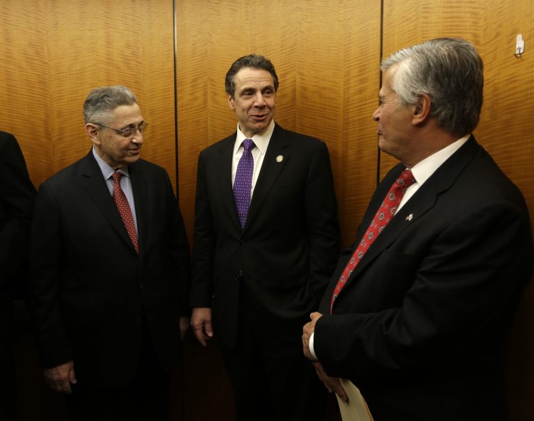 Assembly Speaker Sheldon Silver, D-Manhattan, left, New York Gov. Andrew Cuomo, center, and Senate Republican leader Dean Skelos, R-Rockville Centre, talk on an elevator on March 20 in Albany, N.Y. (AP Photo/Mike Groll)