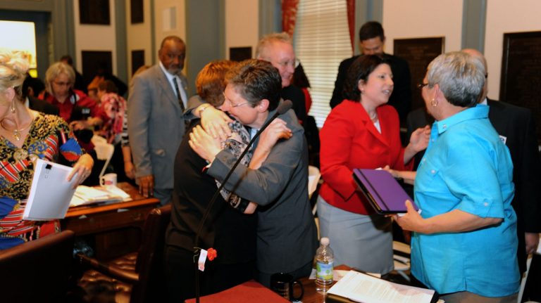 CORRECTS CITY TO DOVER INSTEAD OF WILMINGTON - Lawmakers celebrate after a bill making Delaware the 11th state in the nation to allow same-sex marriage passed in the senate, Tuesday, May 7, 2013 in Dover, Del. (AP Photo/The Wilmington News-Journal, Gary Emeigh) NO SALES