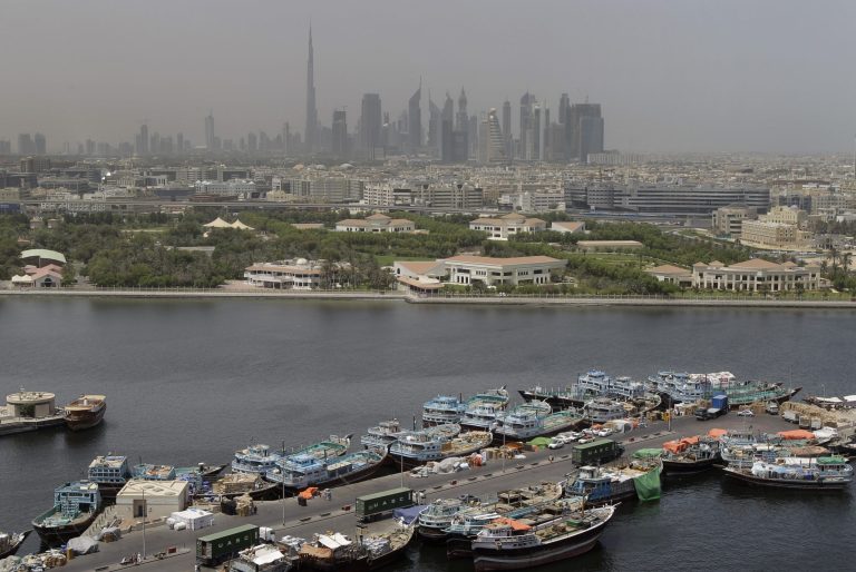   This Sunday, June 10, 2012 photo shows the skyline with world's tallest building, Burj Khalifain in Dubai, United Arab Emirates. (AP Photo/Kamran Jebreili)  