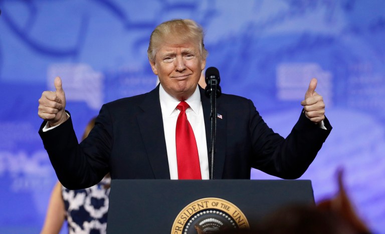 President Trump gives thumbs up as he arrives to speak at the Conservative Political Action Conference in Oxon Hill, Md. (AP Photo/Alex Brandon)
