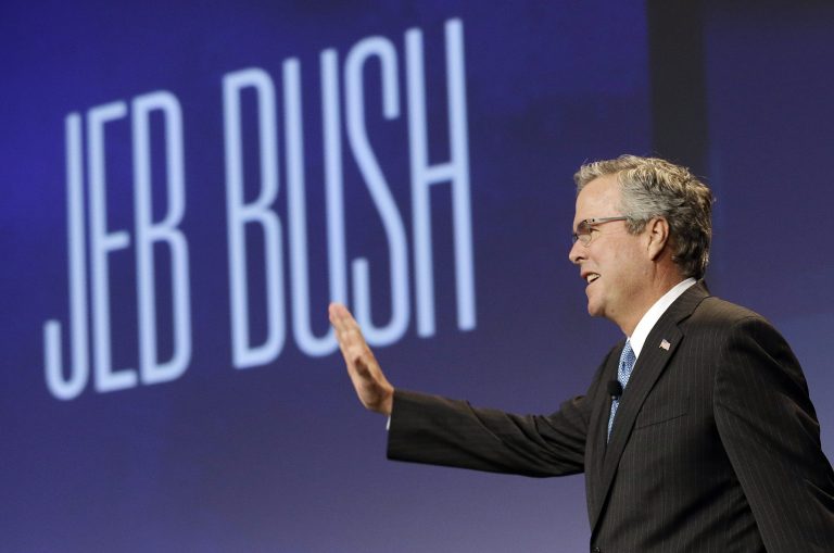 Former Florida Gov. Jeb Bush waves while being introduced before speaking at the National Automobile Dealers Association convention in San Francisco, Friday, Jan. 23, 2015. (AP)