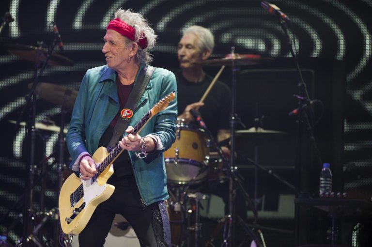   Keith Richards, left, and Charlie Watts of The Rolling Stones perform in concert on Saturday, Dec. 8, 2012 in New York. (Photo by Charles Sykes/Invision/AP)  