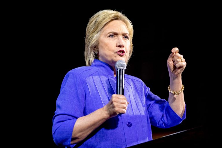 Throughout the speech Clinton tweeted responses back at Trump, condemning his rhetoric and policy proposals. (AP Photo/Andrew Harnik)