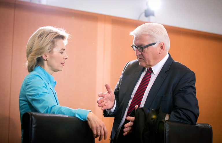 FILE - In this Jan. 15, 2014 file photo German Minister of Defence Ursula von der Leyen, left, and German Foreign Minister Frank-Walter Steinmeier talk at the beginning of a cabinet meeting at the Federal Chancellery in Berlin, Germany. After years in the diplomatic shadows, Germany looks keen to shed its image as a foreign-policy lightweight and assume a more vigorous role in shaping European policies in global hotspots from central Africa to Syria. New Foreign Minister Steinmeier has declared that Europe 
