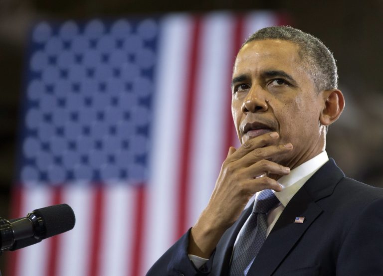 President Obama pauses as he speaks at McGavock High School in Nashville, Tenn. (AP)