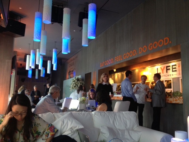 Huffington greets guests at her personal Oasis