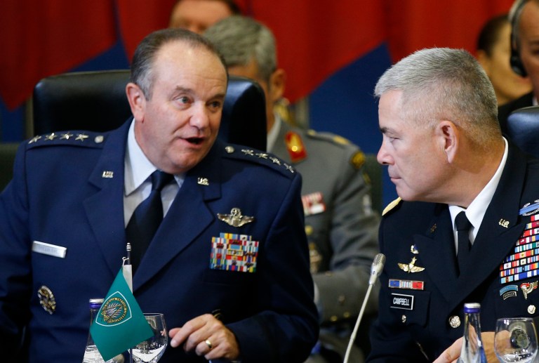 NATO's Supreme Allied Commander, Europe or SACEUR,  U.S. Gen. Philip M. Breedlove, left , and U.S. Army Commander for International Security Assistance Forces (ISAF), Gen. John F. Campbell  attend on  NATO Military Committee Conference in Vilnius, Lithuania, Saturday, Sept. 20, 2014.  (AP Photo/Mindaugas Kulbis)