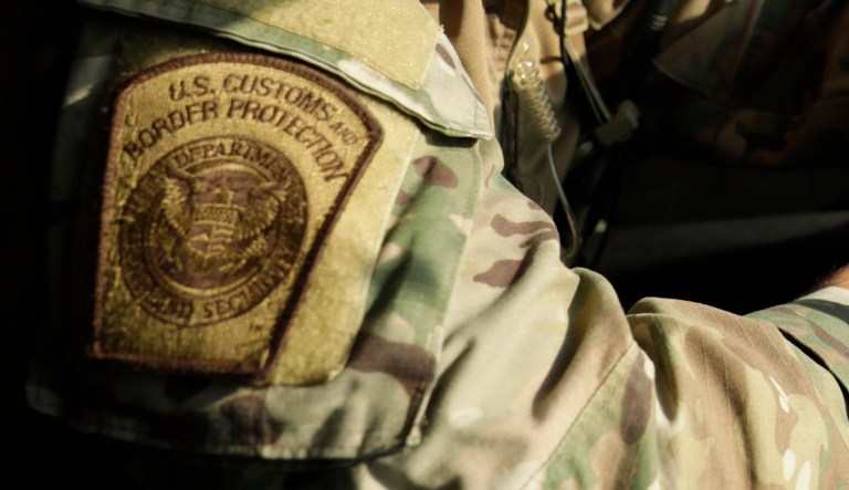 A member of the U.S. Border Patrol Search, Trauma, and Rescue team wears a Custom and Border Protection patch in the Eagle Pass, Texas, area.