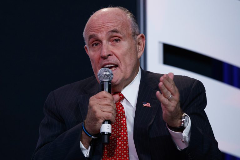 Rudy Giuliani offered a description of the GOP nominee's relationship with the Russian leader that contradicted Trump's previous statements. (AP Photo)