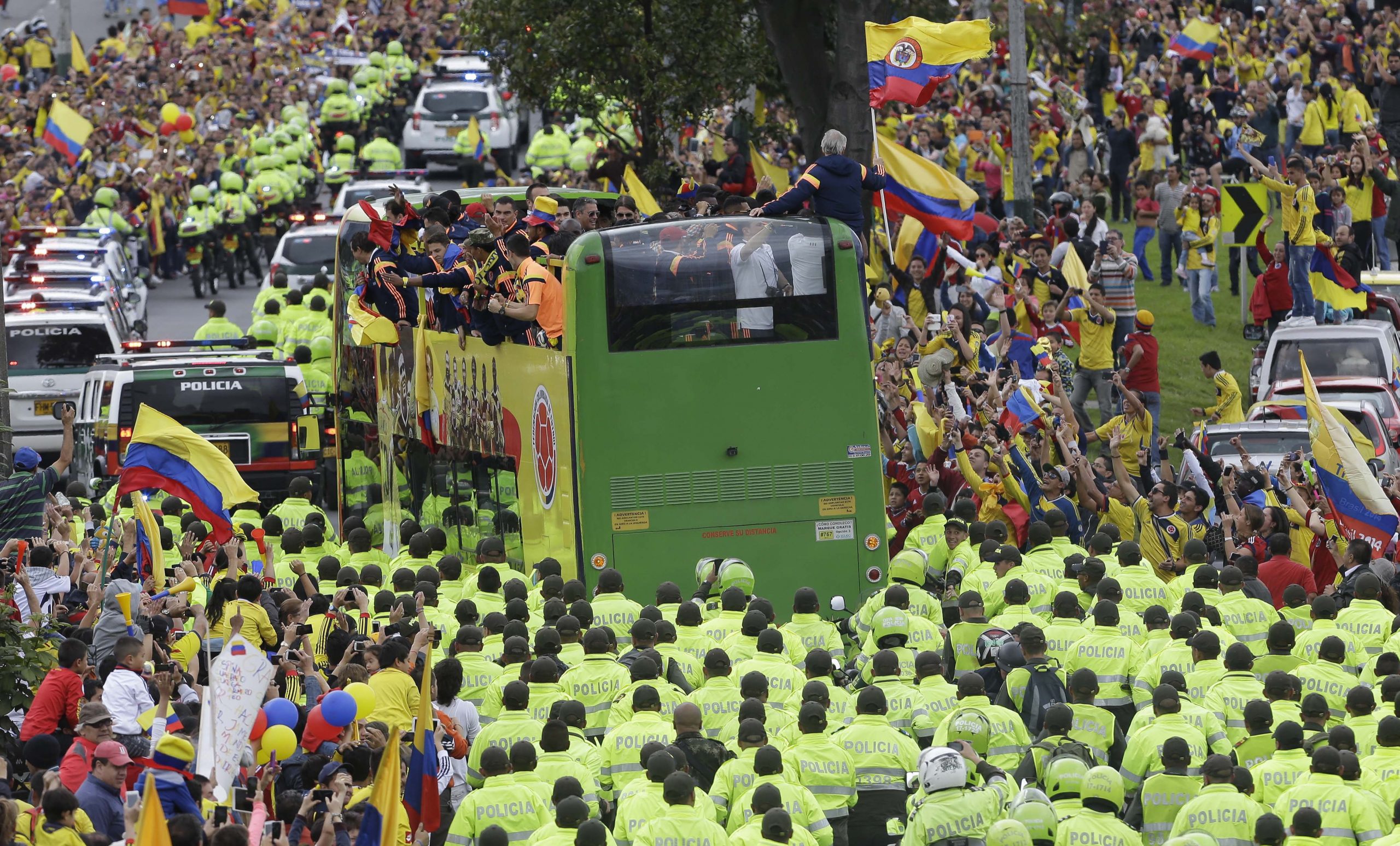 Colombia WCup team welcomed home as heroes