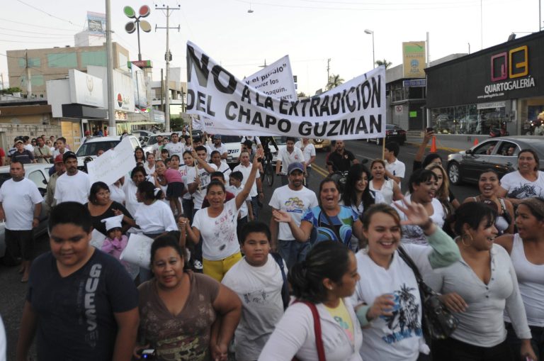 People march in support of jailed drug boss Joaquin Guzman Loera, 
