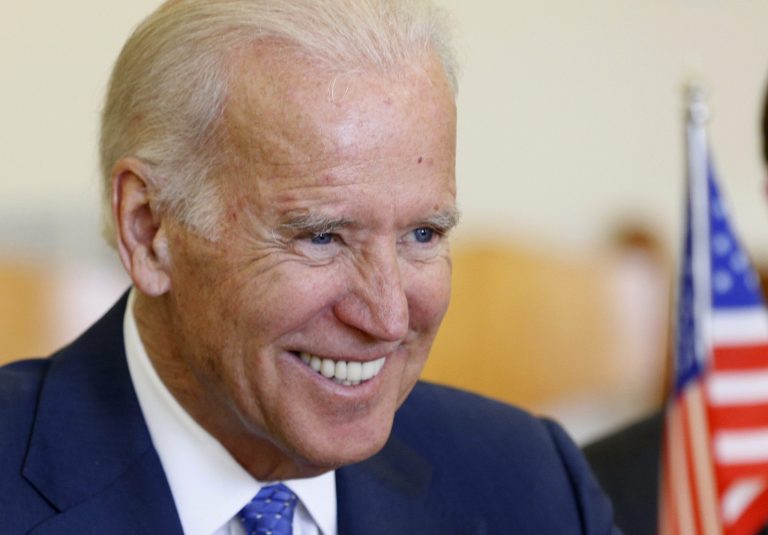 Vice President Joe Biden smiles during a meeting with Lithuania's President Dalia Grybauskaite and Liatvia's President Andris Berzins at the Presidential palace in Vilnius, Lithuania, Wednesday, March 19, 2014. Biden arrived in Vilnius for consultations with Grybauskaite and Berzins, a few hours after Russian President Vladimir Putin approved a draft bill for the annexation of Crimea, one of a flurry of steps to formally take over the Black Sea peninsula. (AP Photo/Mindaugas Kulbis)