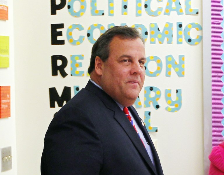 New Jersey Gov. Chris Christie visits with students at Jose Marti Freshman Academy in Union City, N.J. Wednesday, Nov. 6, 2013, the day after defeating Democratic challenger Barbara Buono to win his second term as governor. (AP Photo/Rich Schultz)