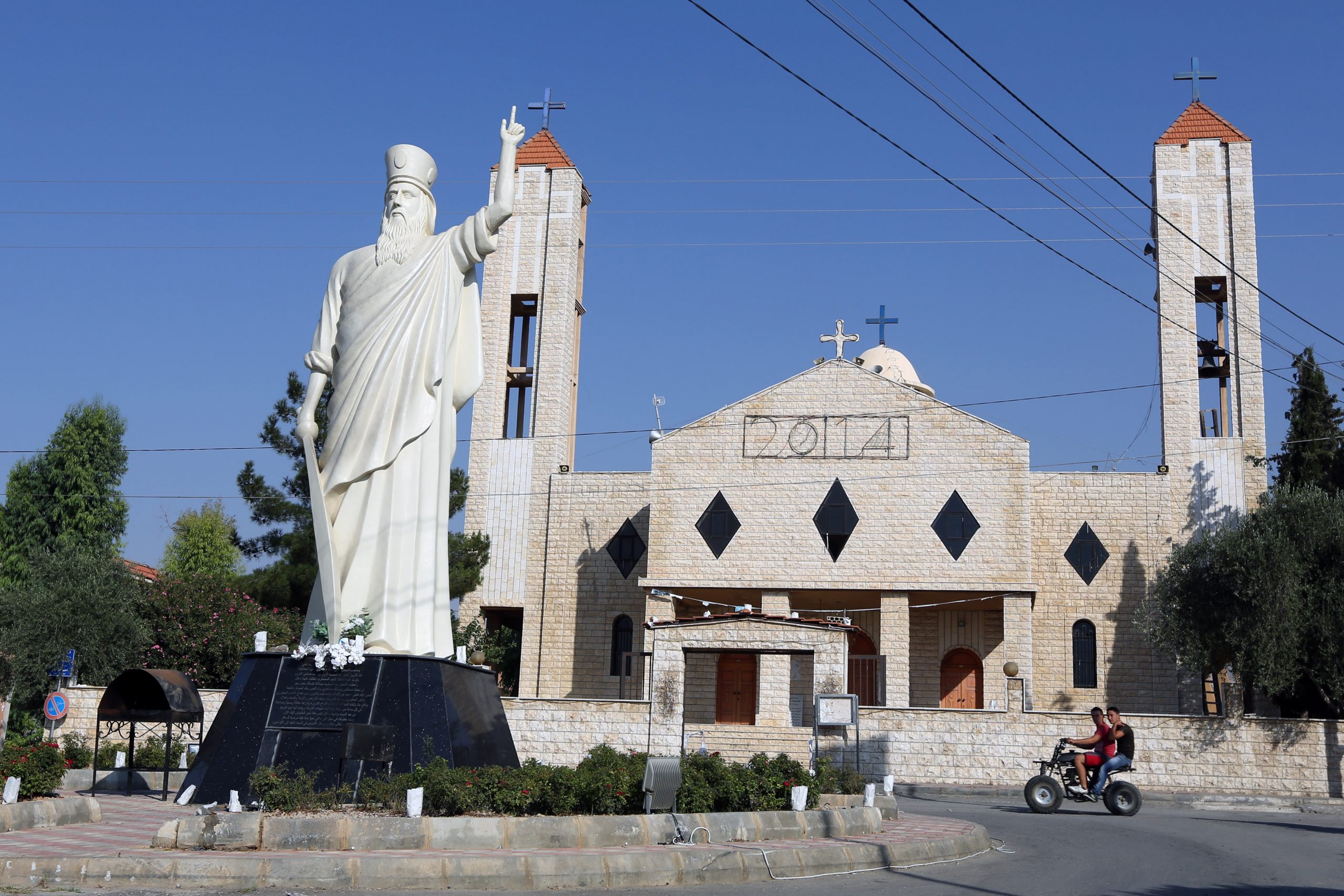 Some Christians arm as Mideast perils mount