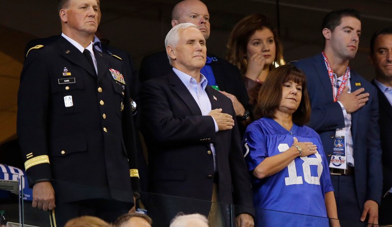 Vice President Mike Pence stands during the playing of the national anthem before an NFL football game between the Indianapolis Colts and the San Francisco 49ers, Sunday, Oct. 8, 2017, in Indianapolis. 