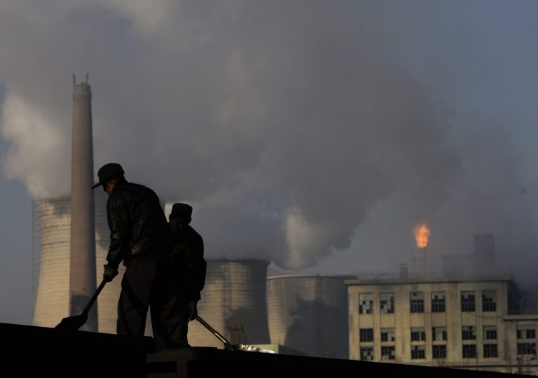 Miners shovel coal at a mine in Xiahuayuan county, north China's Hebei province. President Barack Obama's proposal to curb U.S. greenhouse gas emissions might improve the chances of completing a global climate treaty but is unlikely to defuse demands by China, India and others for Americans to do more. China, the biggest emitter, has promised to curb its output but with its economy slowing, and communist leaders under pressure to generate jobs, has resisted binding limits. (AP Photo/Oded Balilty, File)