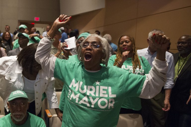 Supporters of D.C. Councilmember Muriel Bowse, who defeated incumbent mayor Vincent Gray in the April Democratic primary, express themselves during the first three candidate D.C. Mayoral candidate debate at American University in Washington, Thursday, Sept. 18, 2014.  The election will take place on Nov. 4, 2014, to elect the Mayor of Washington, D.C. (AP Photo/Cliff Owen)