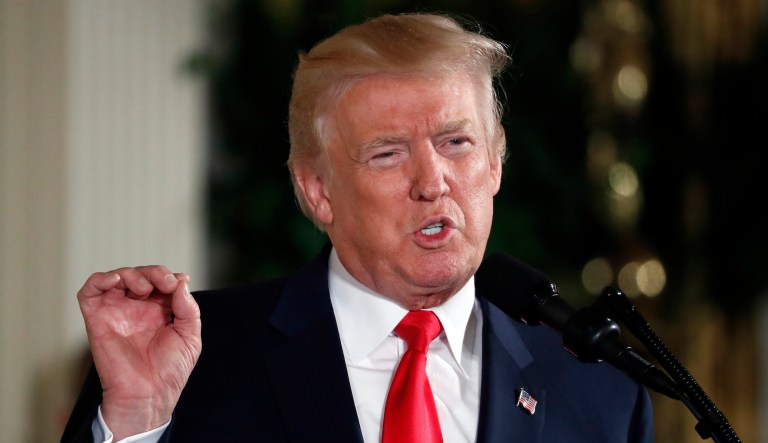 President Trump on Tuesday accused the media of failing to report Wall Street's record-high numbers on Monday. (AP Photo/Alex Brandon)